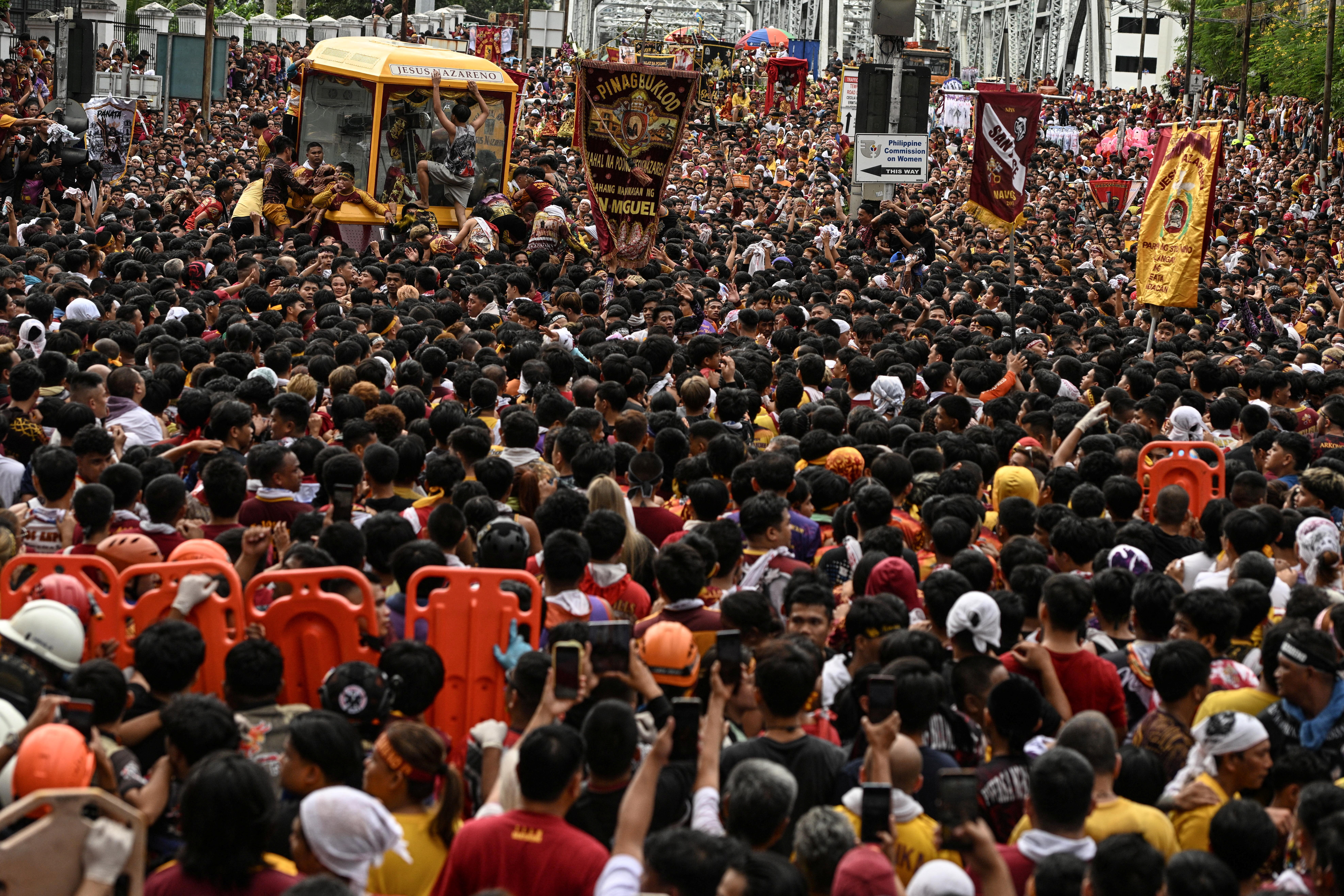 Filipino devotees join the annual Catholic procession of the Black Nazarene