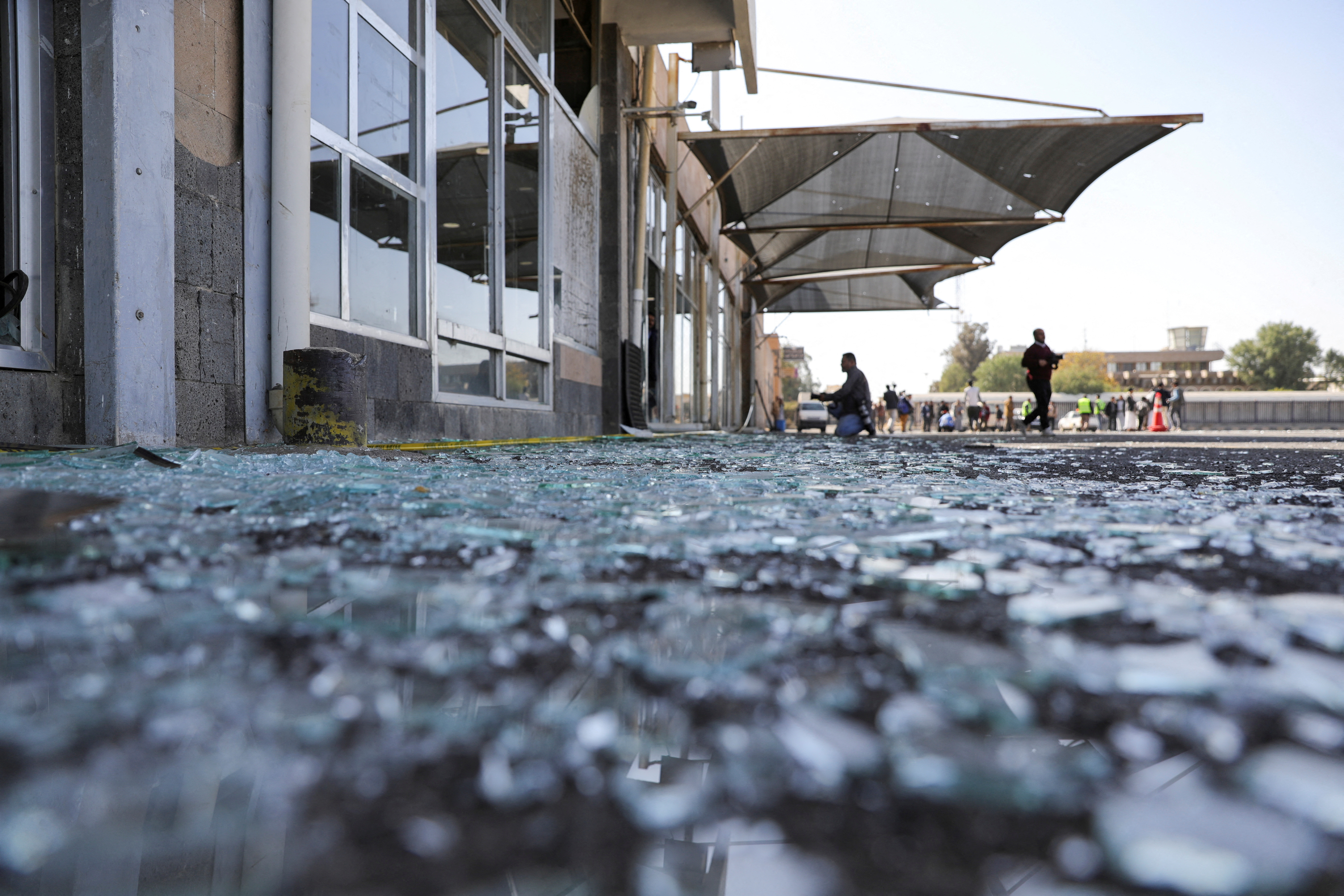 Aftermath of an Israeli strike near damaged buildings of Sanaa Airport