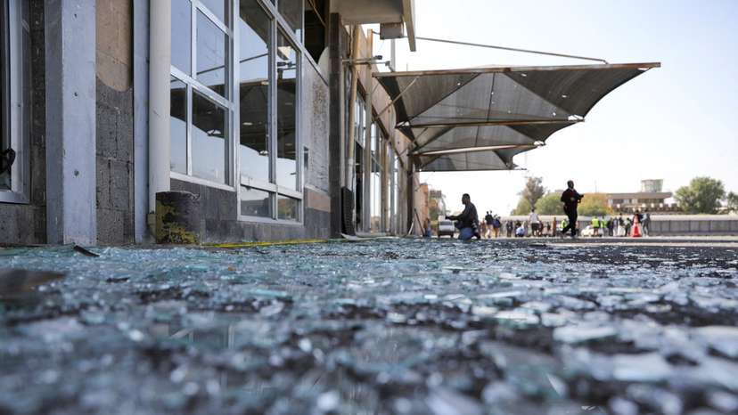 Aftermath of an Israeli strike near damaged buildings of Sanaa Airport
