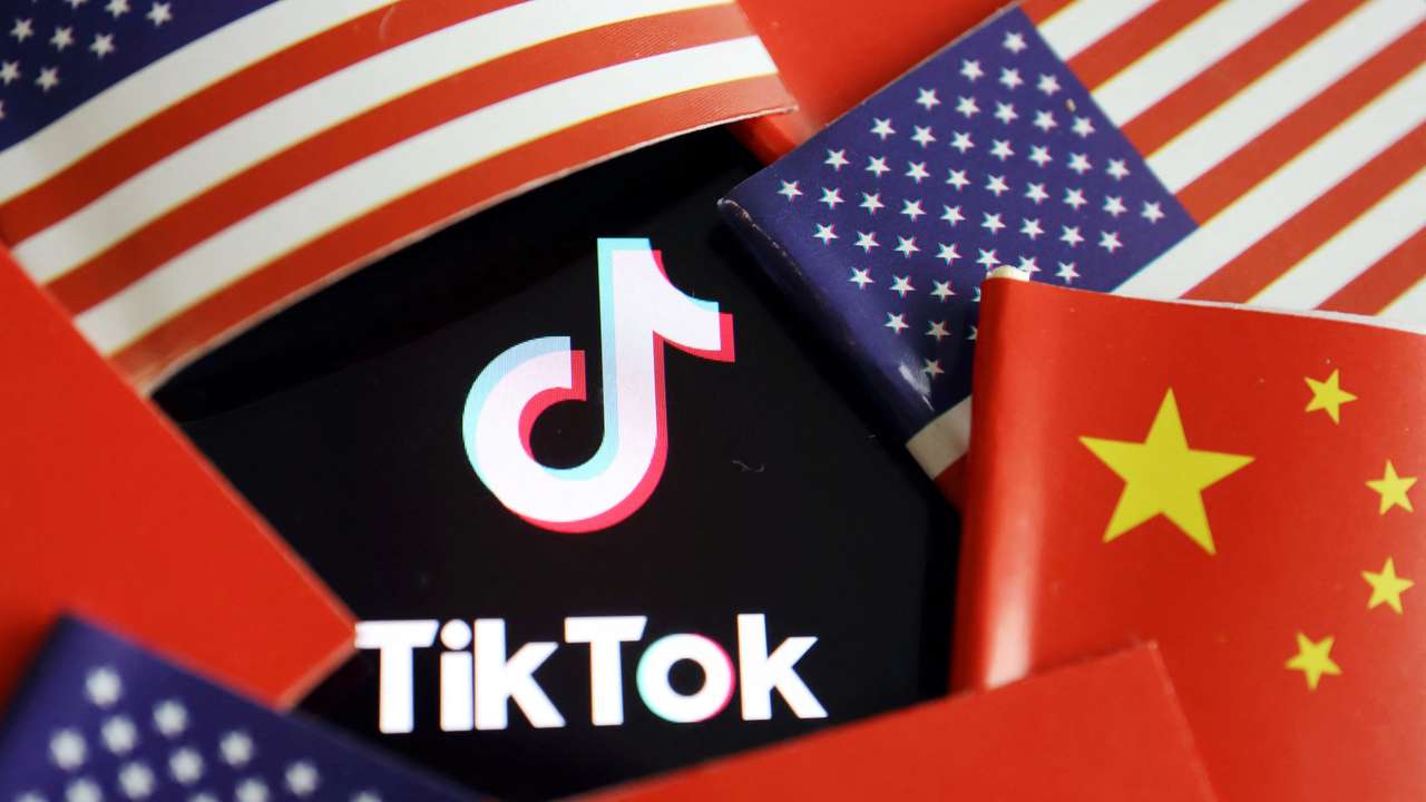 FILE PHOTO: Illustration picture of Tiktok with U.S. and Chinese flags