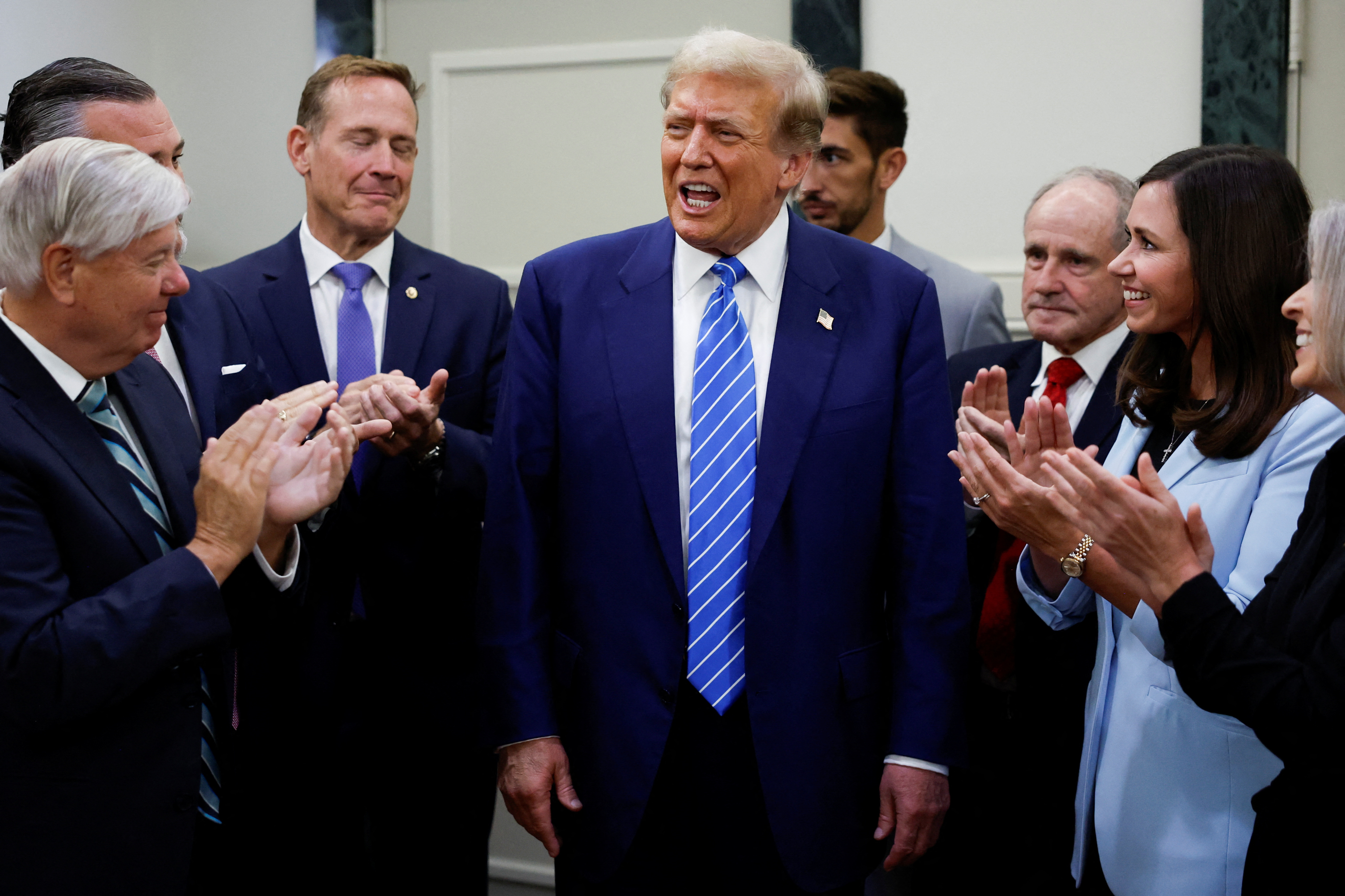 Republican presidential candidate Trump speaks to the media following meetings with Republicans on Capitol Hill, in Washington