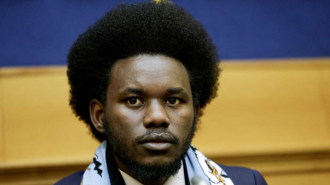 FILE PHOTO: David Yambio from South Sudan looks on as he holds a press conference with other migrants at the Parliament in Rome