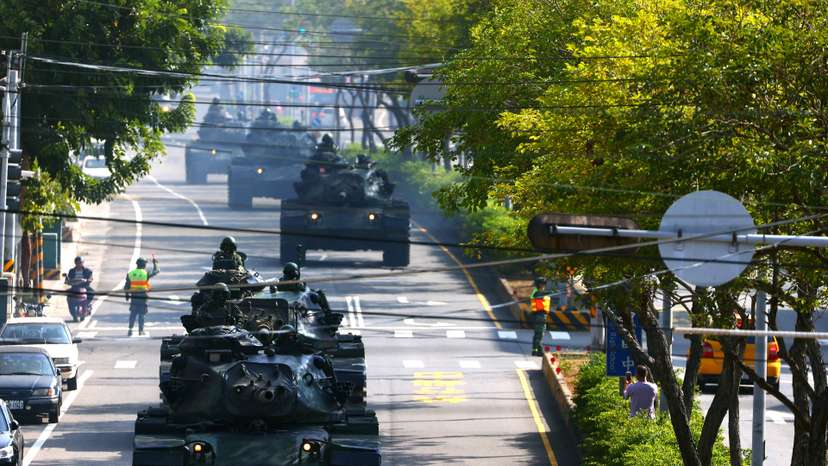 FILE PHOTO: Soldiers drive M60 tanks on a street as part of a military drill in Taichung