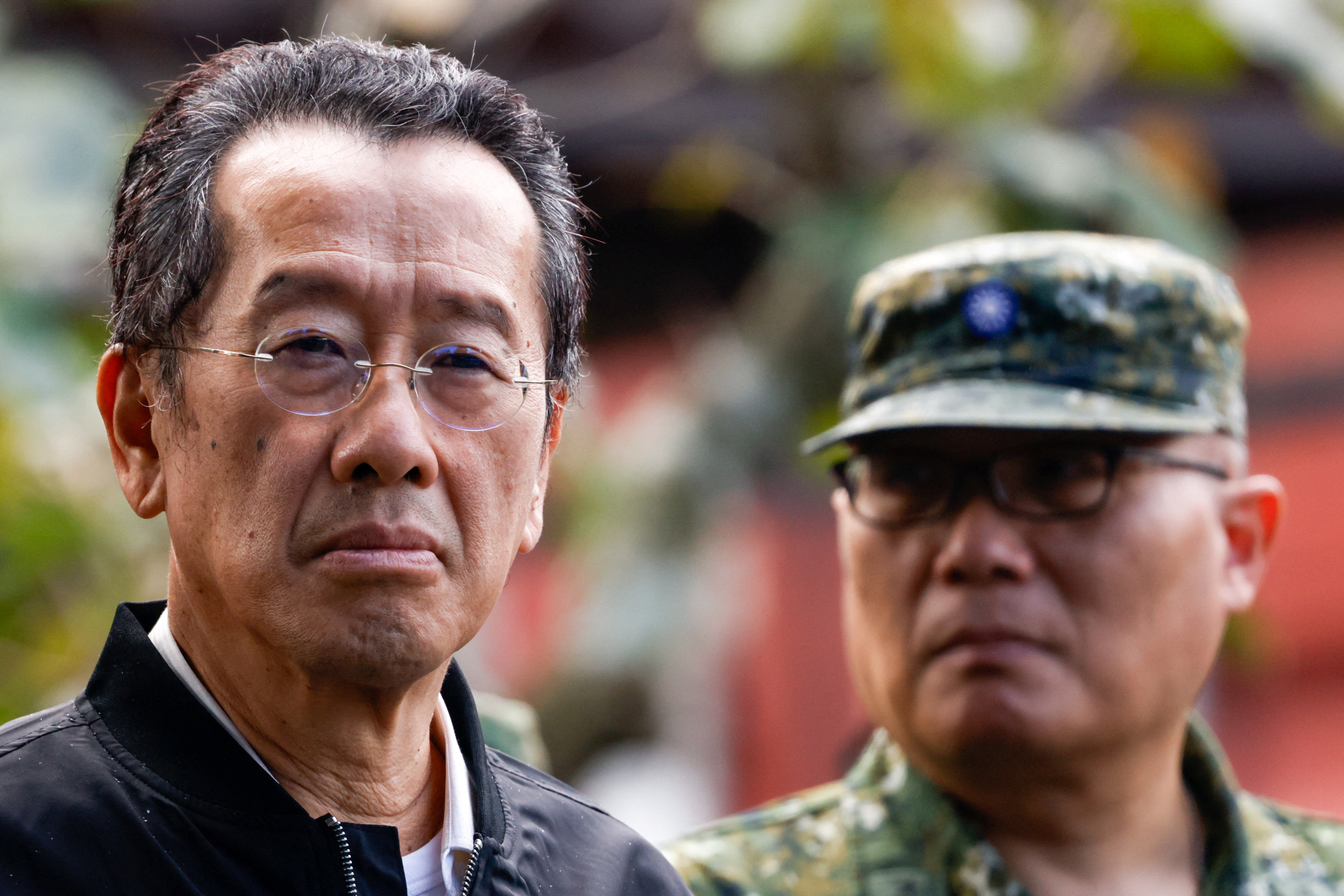 Taiwan Defence Minister Wellington Koo inspects reservists during a training session at Loung Te Industrial Parks Service Center in Yilan
