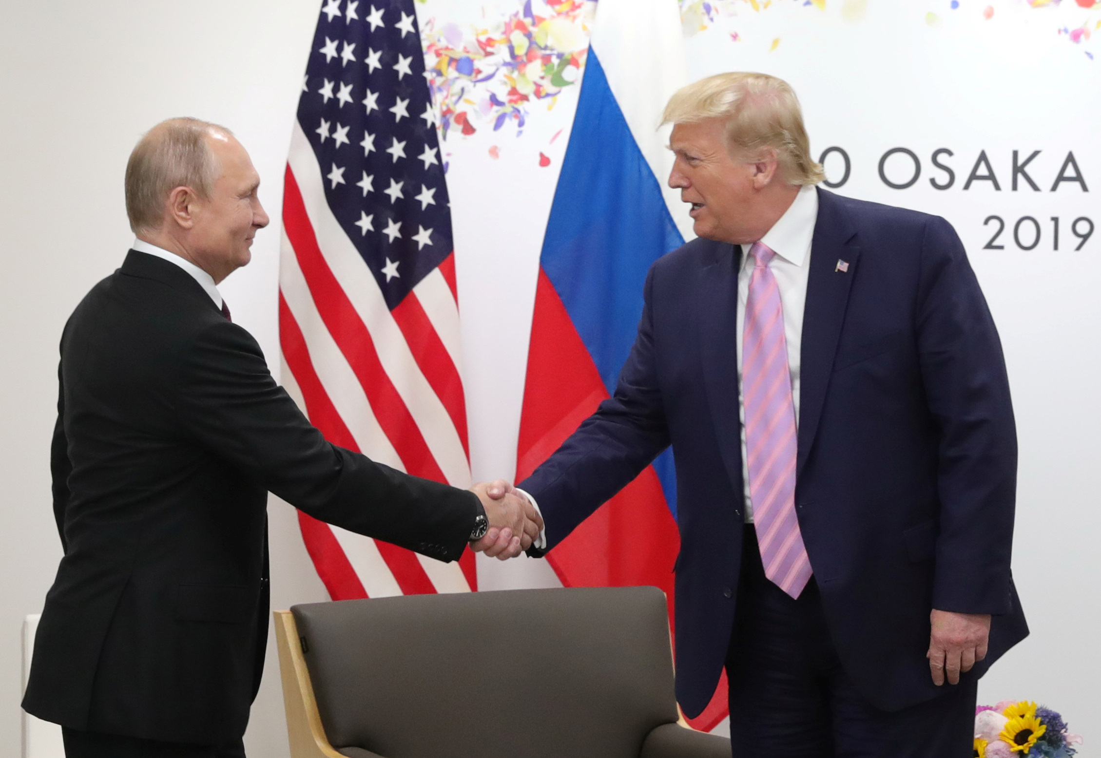 Russia's President Vladimir Putin and U.S. President Donald Trump attend a meeting on the sidelines of the G20 summit in Osaka