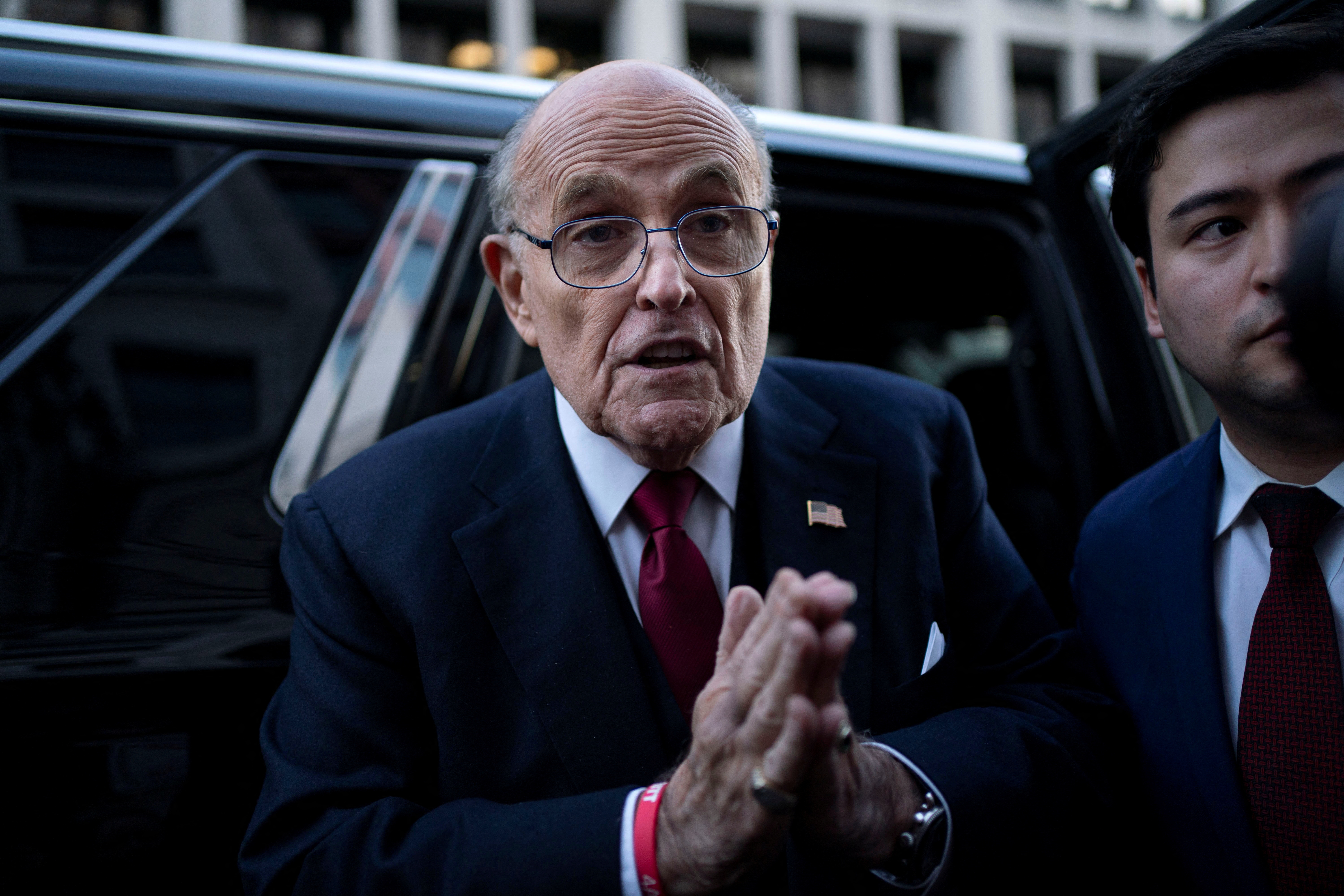 Former New York Mayor Rudy Giuliani departs defamation lawsuit at the District Courthouse in Washington