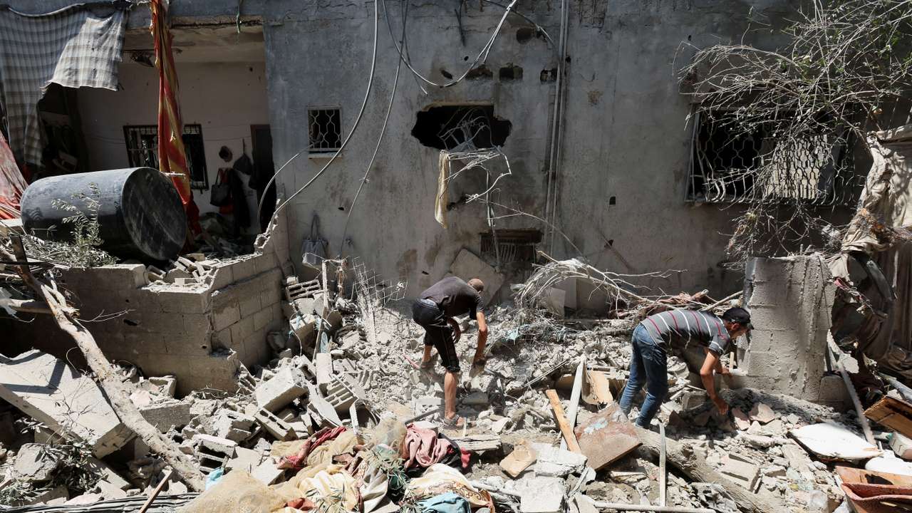 Aftermath of an Israeli strike on a house, in Deir Al-Balah in the central Gaza Strip