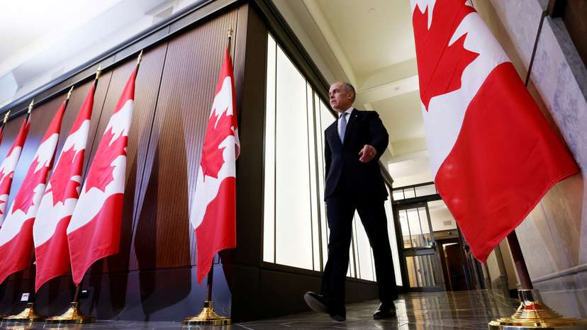 Canada's Prime Minister Mark Carney takes part in a press conference to discuss a response to U.S. President Donald Trump's new tariffs, in Ottawa