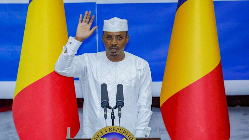 FILE PHOTO: Chad President Mahamat Idriss Deby raises his hand during his inauguration ceremony