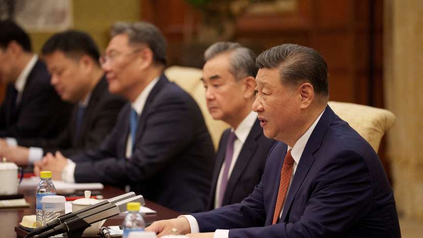 FILE PHOTO: Chinese President Xi Jinping and his delegation attend a meeting with Italian Premier Giorgia Meloni, at the Diaoyutai State Guesthouse in Beijing
