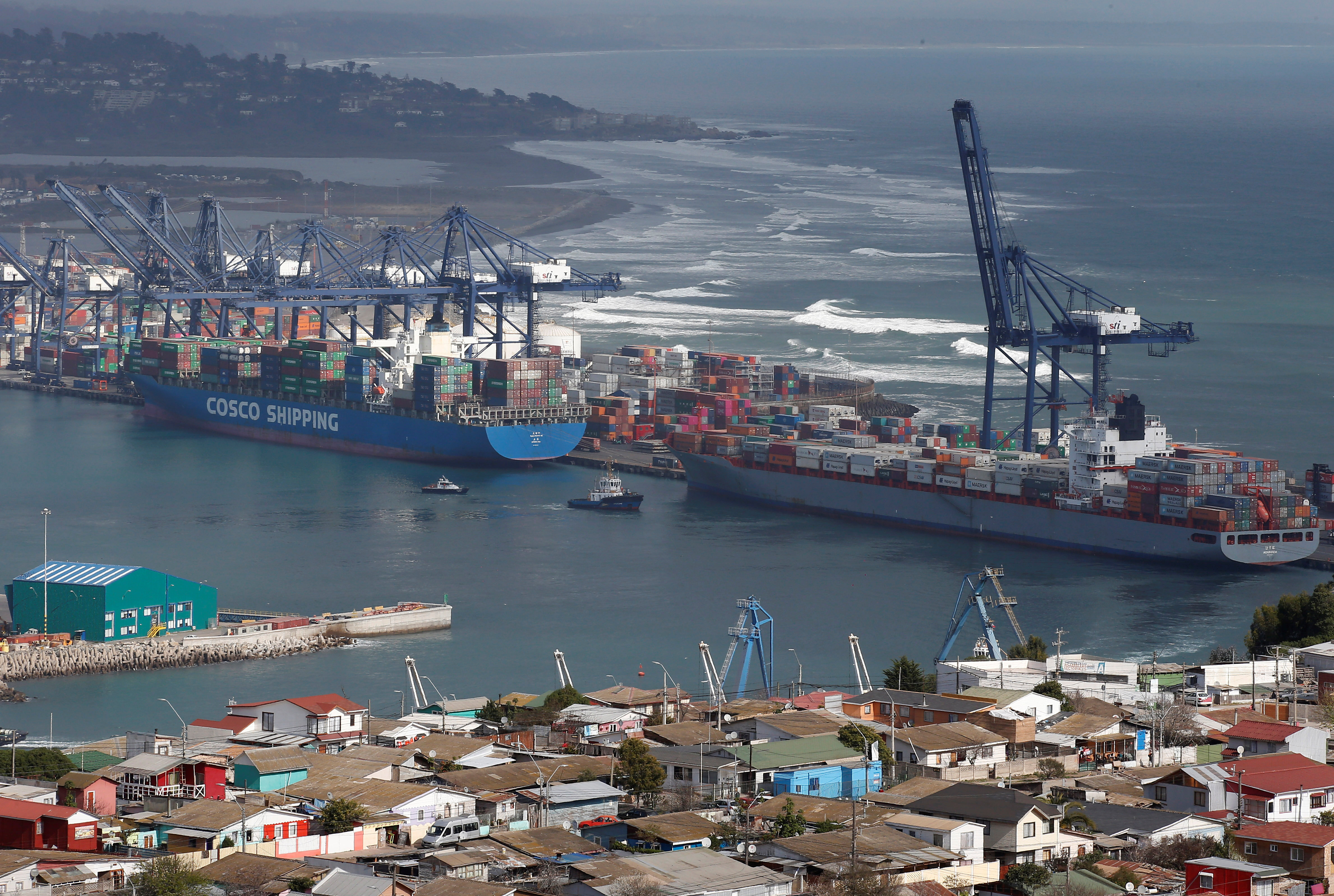 Containers ships are seen at the San Antonio port