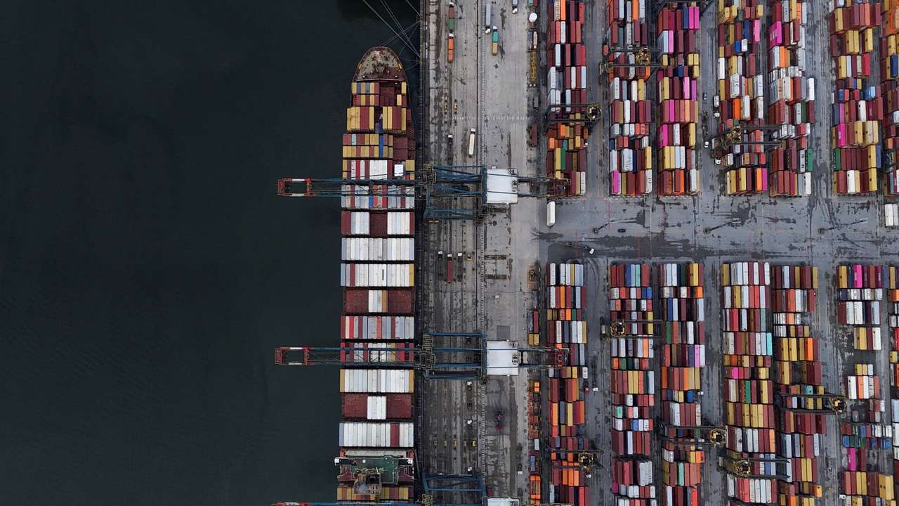 FILE PHOTO: A drone view shows a ship and containers at the Port of Santos, in Santos