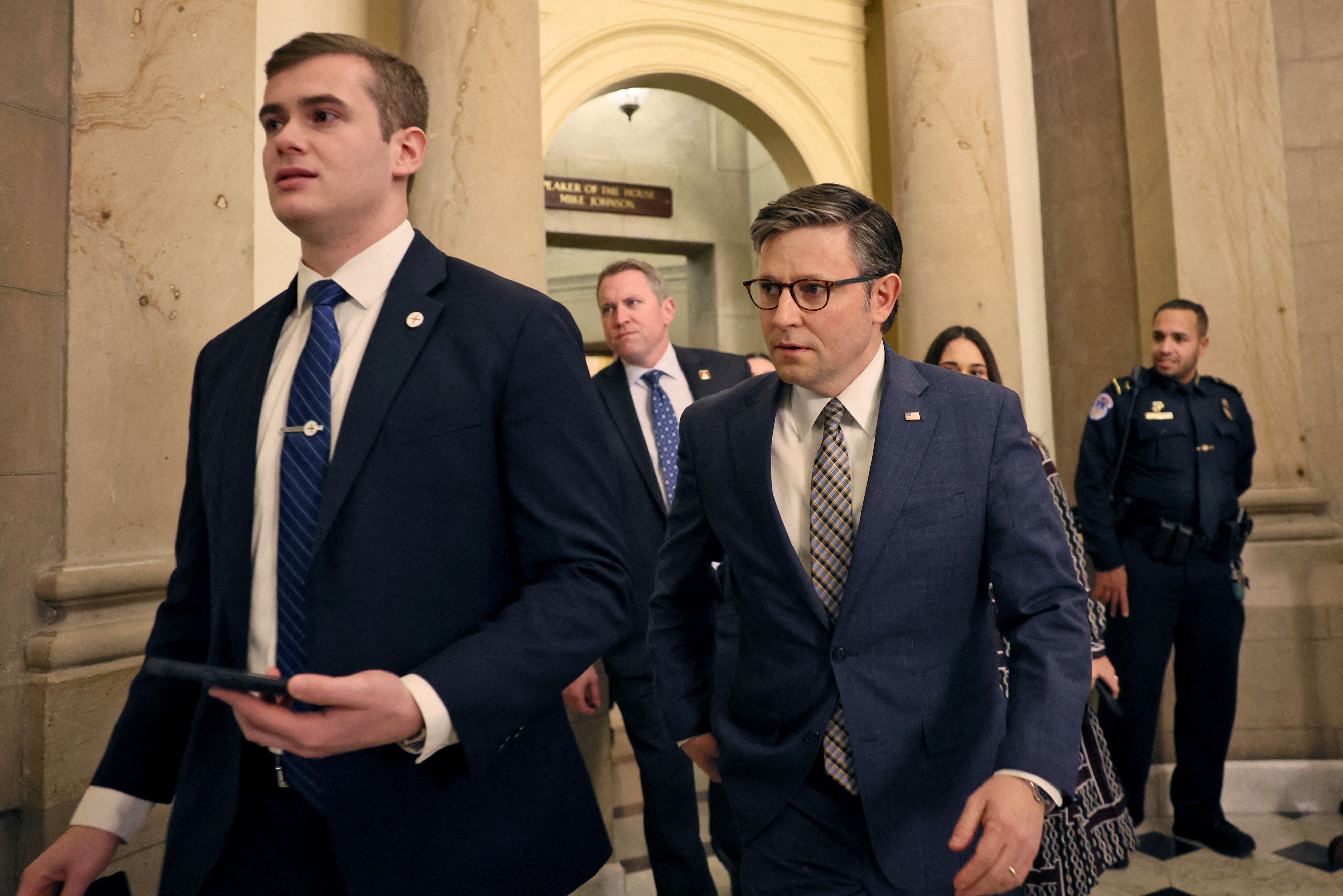 FILE PHOTO: House Speaker Johnson leaves his office as the deadline to avoid partial government shutdown looms in Washington, U.S.