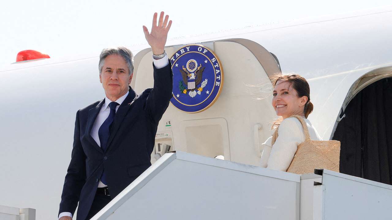 FILE PHOTO: U.S. Secretary of State Blinken boards a plane at the U.S. Naval Support Activity base in Naples