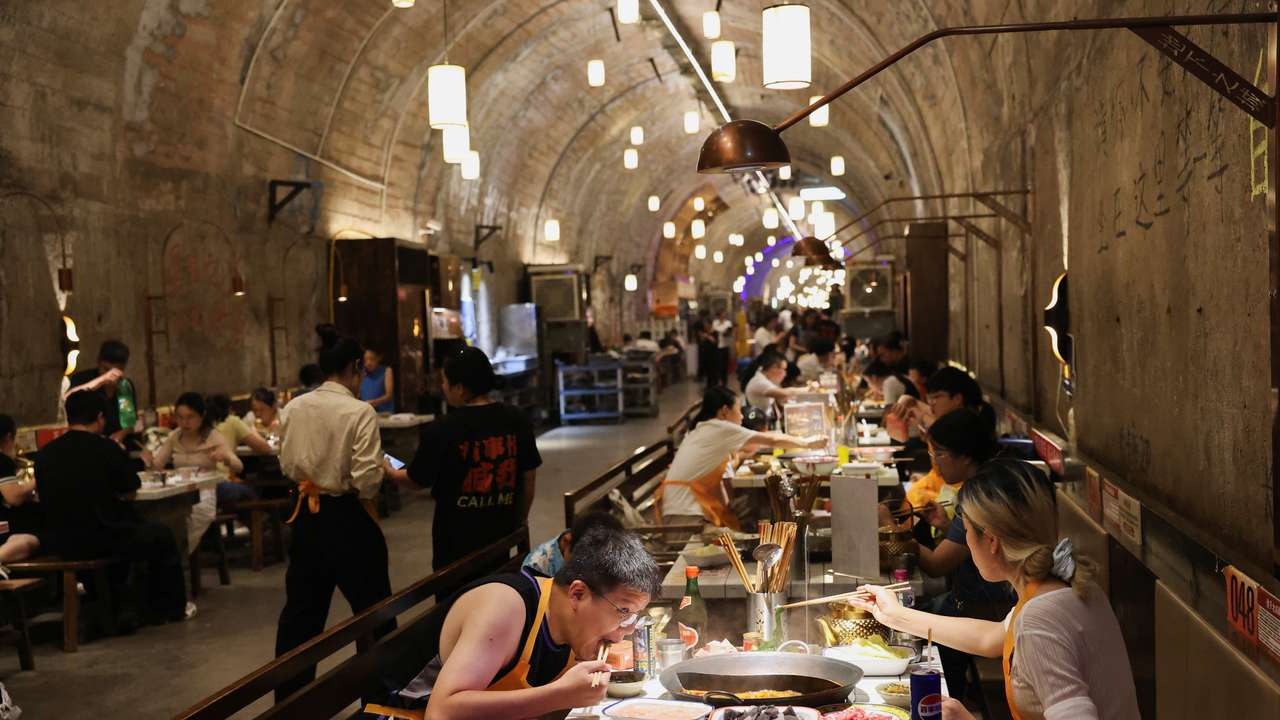 People eat hot pot amid a red alert for heat in Chongqing