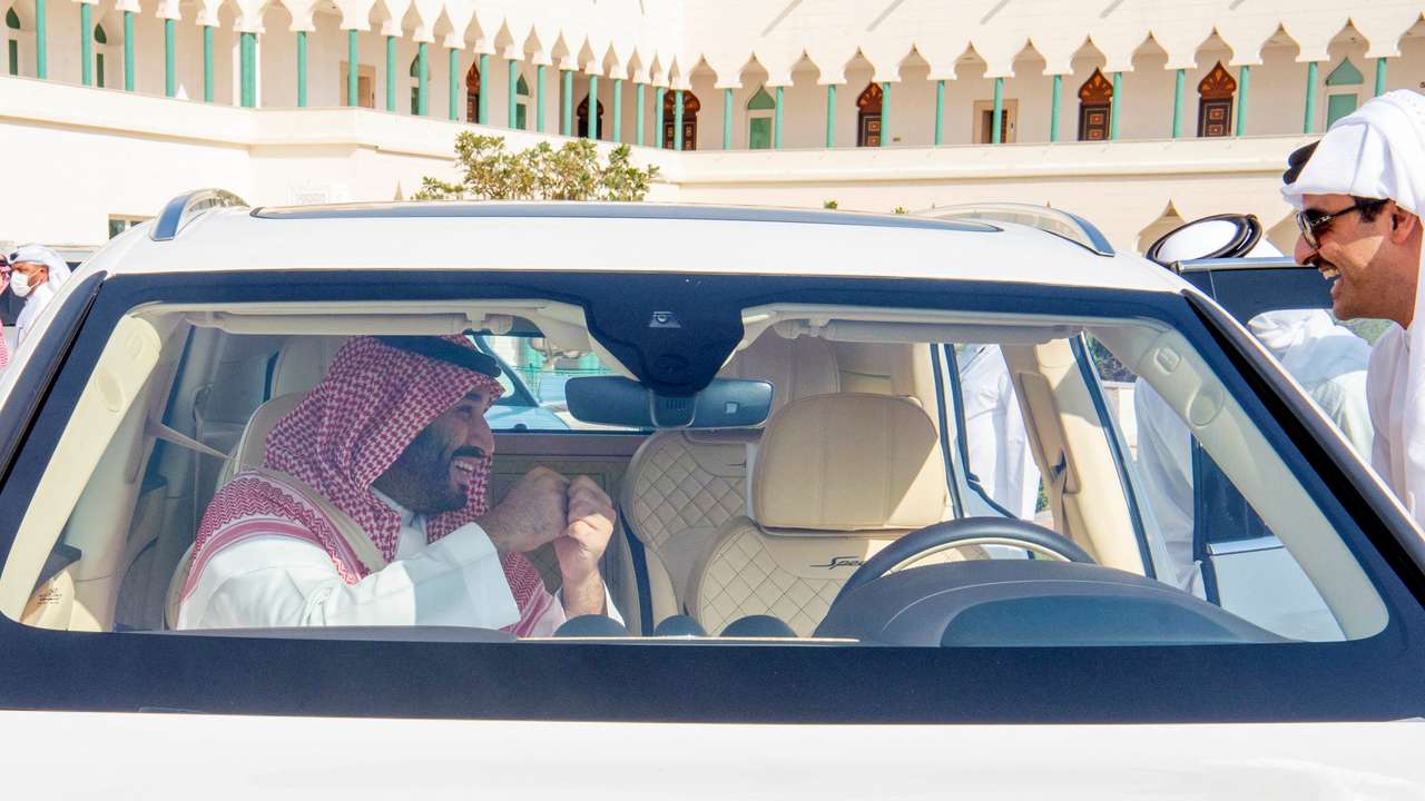 Saudi Crown Prince Mohammed Bin Salman talks to Amir of Qatar Sheikh Tamim bin Hamad Al Thani during his visit to Doha, Qatar