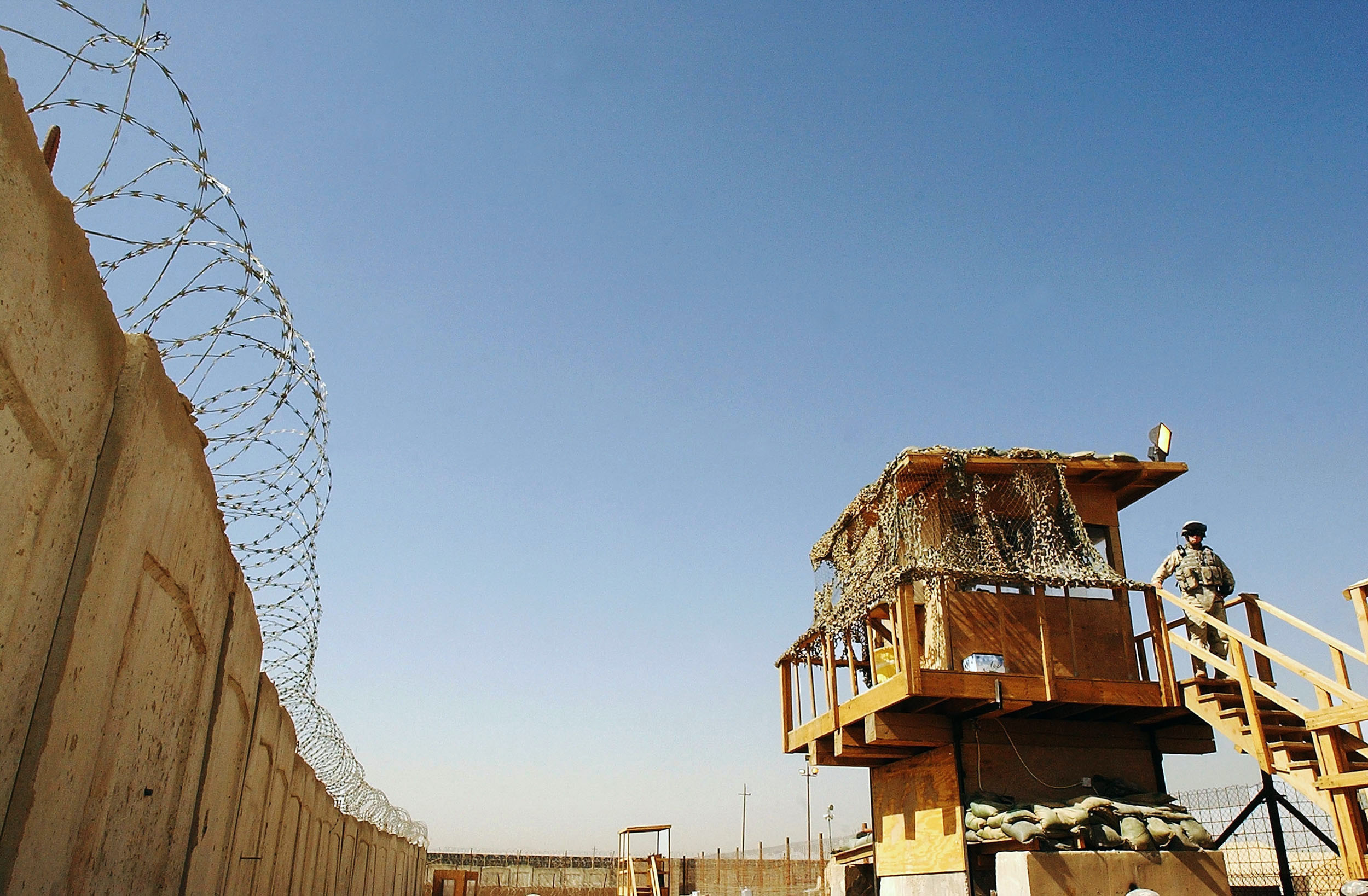 A US soldier stands guard at Abu Ghraib prison west of Baghdad
