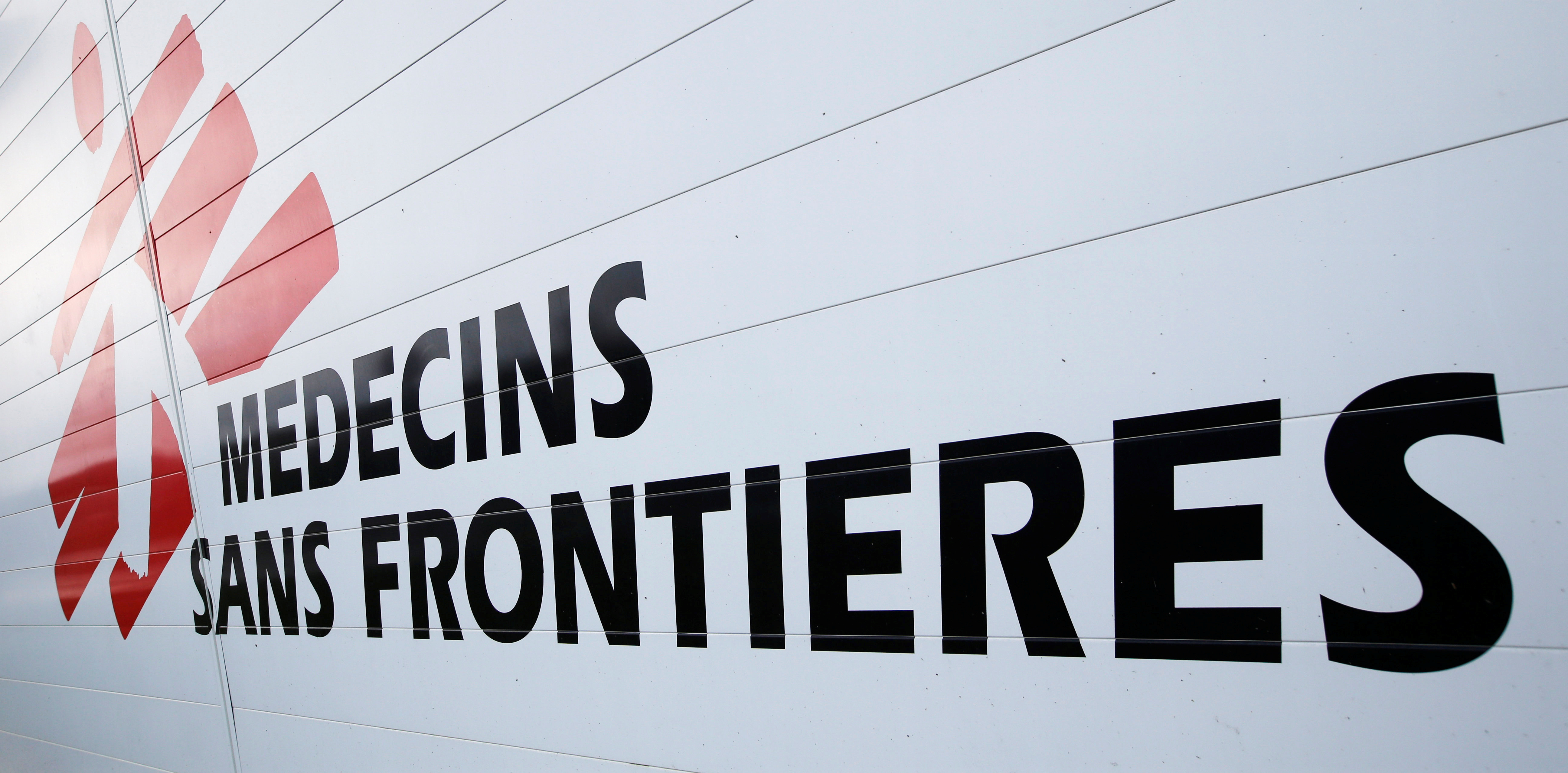 The logo of Medecins Sans Frontieres is seen at the international medical humanitarian organisation MSF logistique centre in Merignac