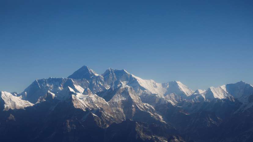 Mount Everest, the world highest peak, and other peaks of the Himalayan range are seen through an aircraft window during a mountain flight from Kathmandu