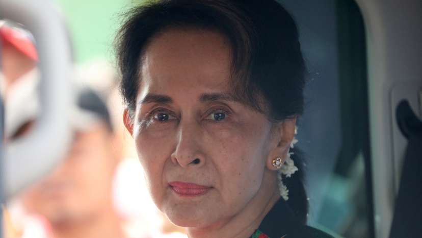 Myanmar's State Counsellor Aung San Suu Kyi arrives at a school in Kawhmu