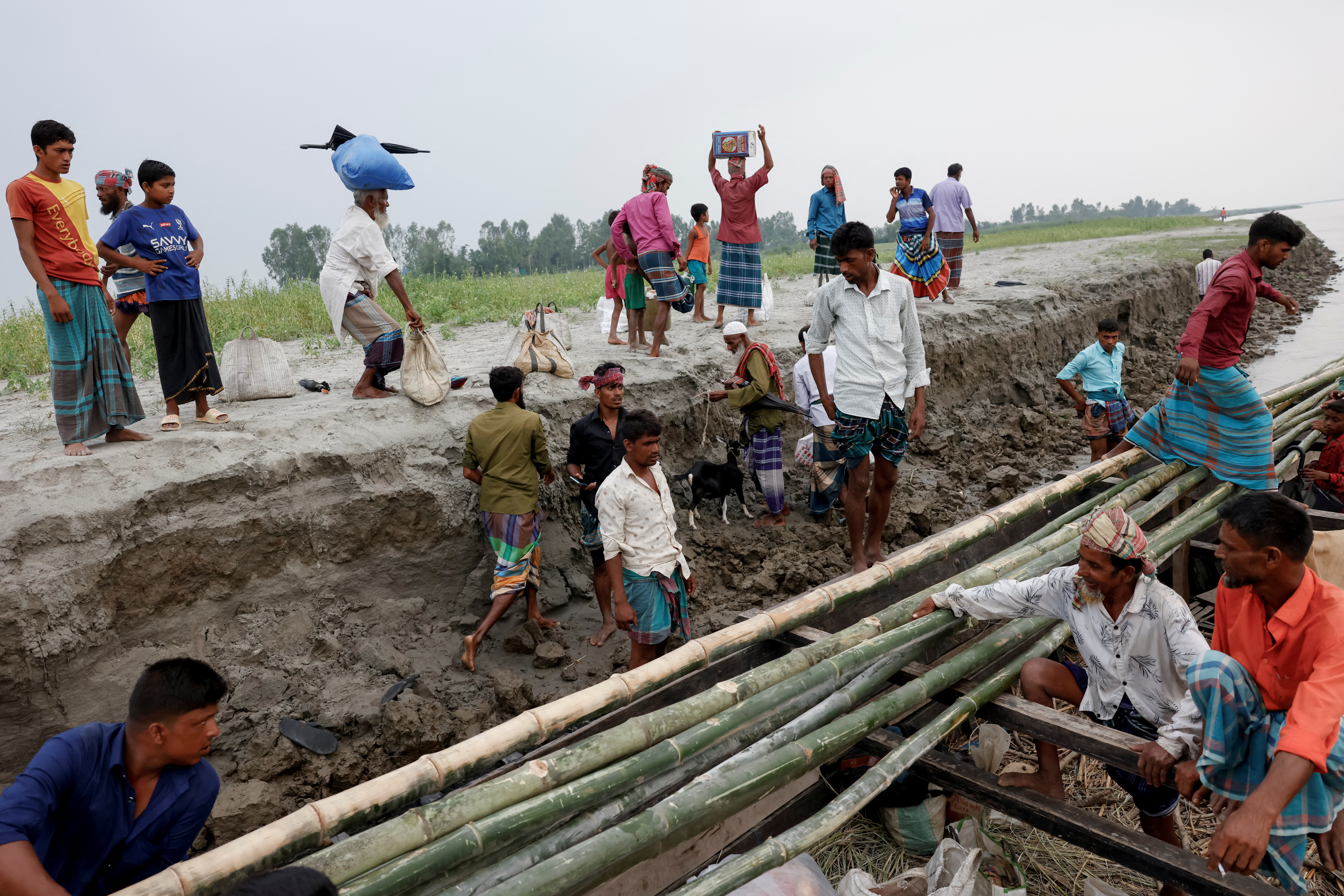 River erosion forces people to shifting their home in Bangladesh