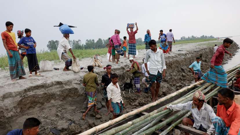 River erosion forces people to shifting their home in Bangladesh