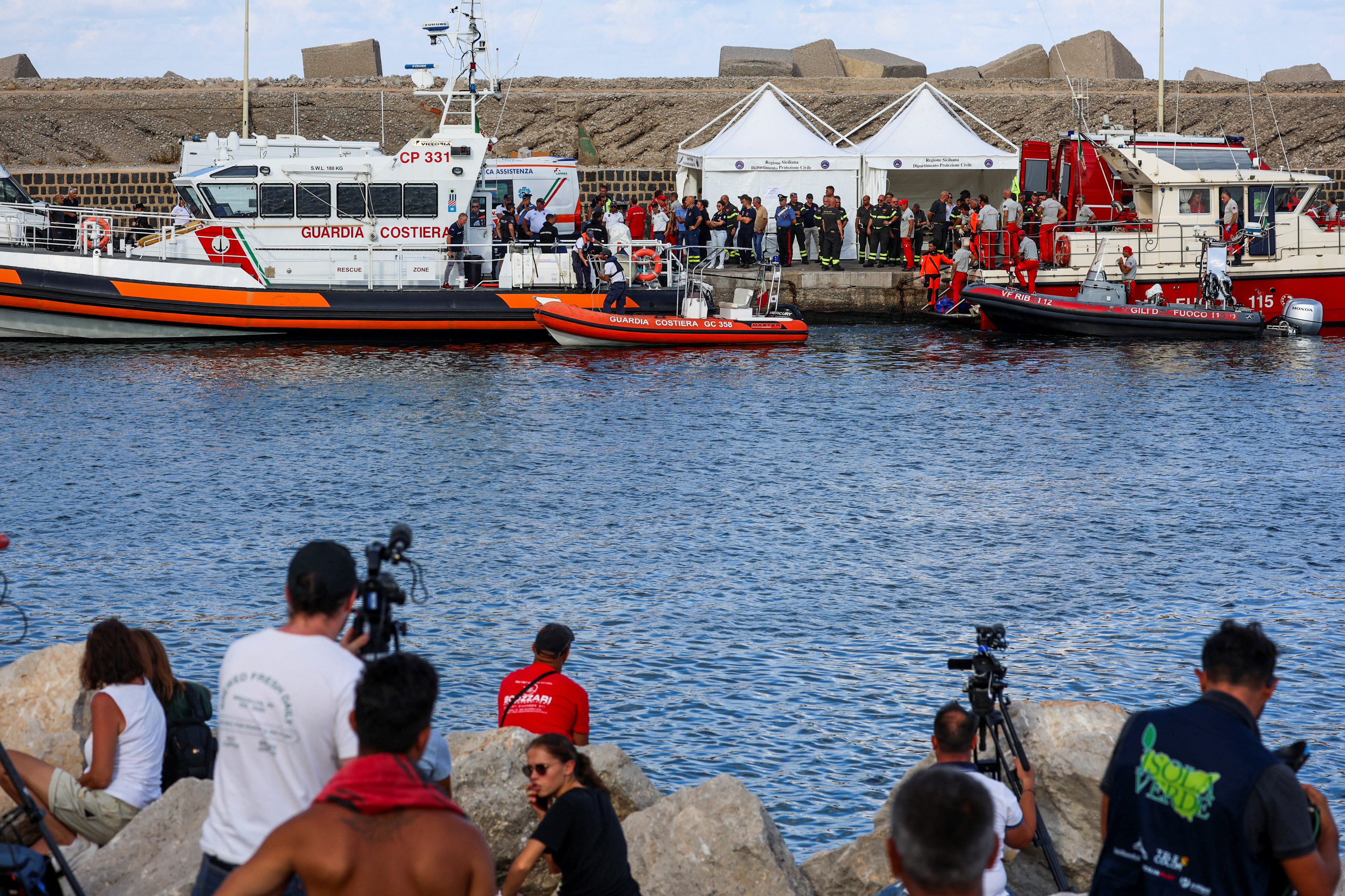 Rescue operations continue after a luxury yacht sank off Sicily