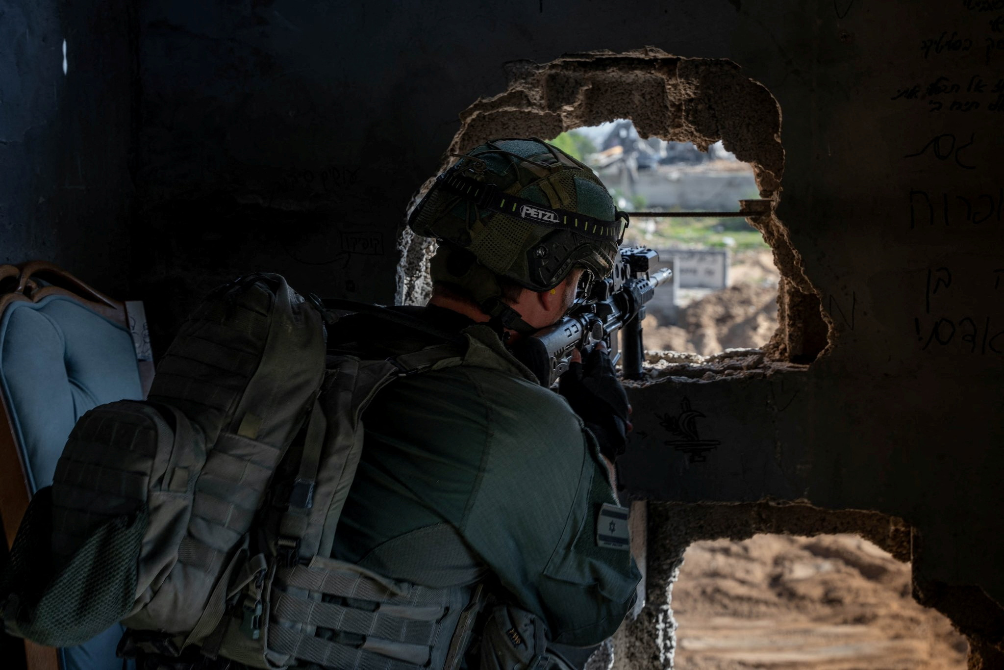 An Israeli soldier operates in the Gaza Strip amid the ongoing conflict between Israel and the Palestinian Islamist group Hamas