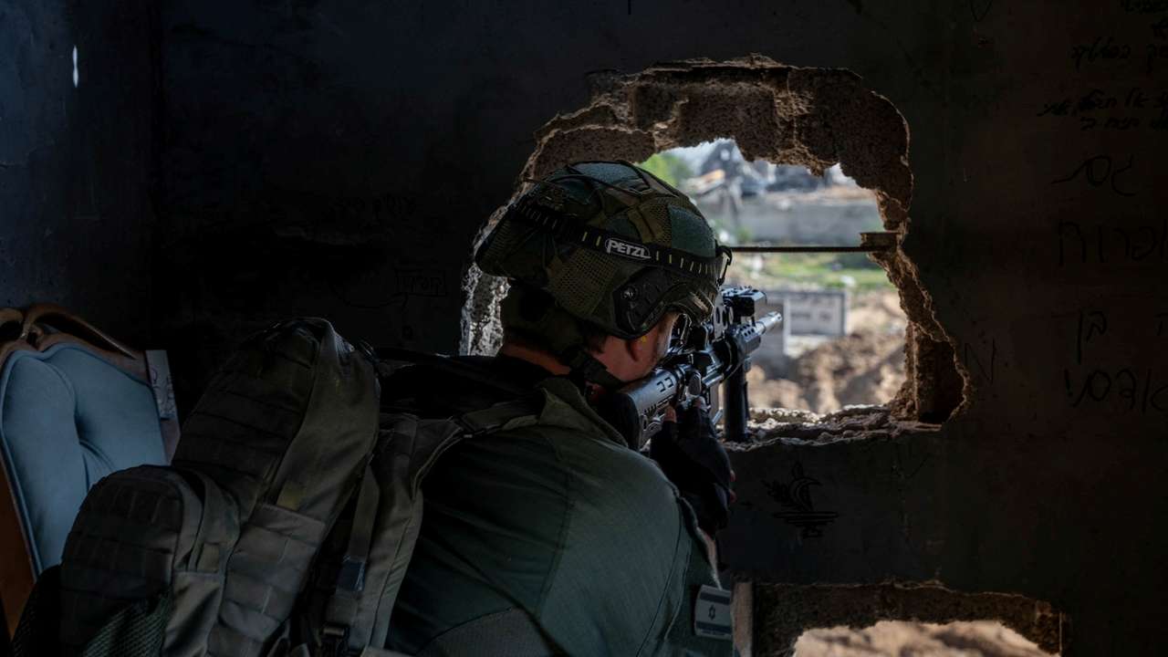 An Israeli soldier operates in the Gaza Strip amid the ongoing conflict between Israel and the Palestinian Islamist group Hamas
