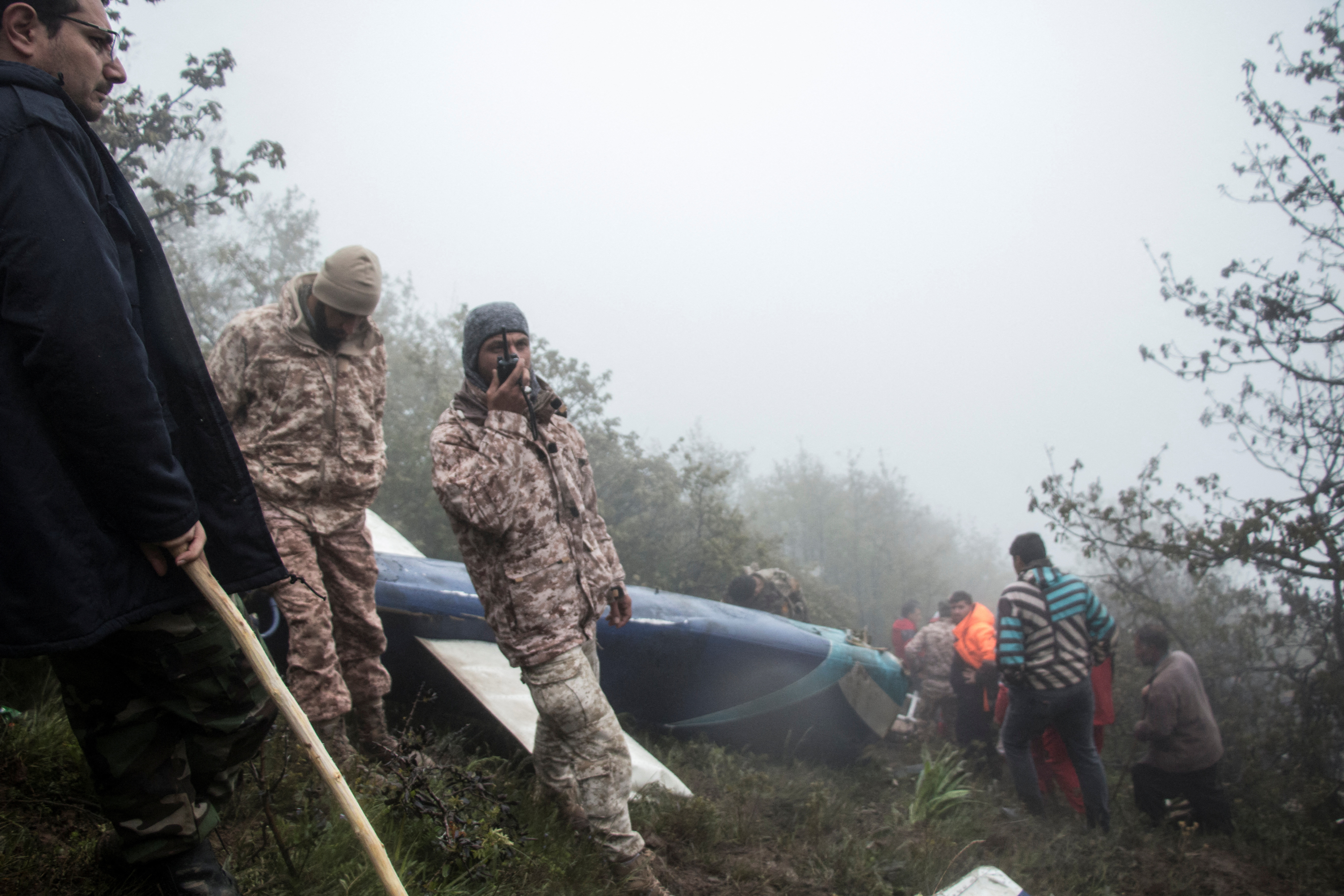 Rescue team works following a crash of a helicopter carrying Iran's President Ebrahim Raisi, in Varzaqan