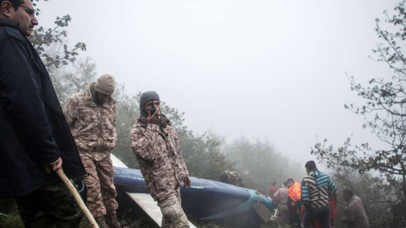 Rescue team works following a crash of a helicopter carrying Iran's President Ebrahim Raisi, in Varzaqan