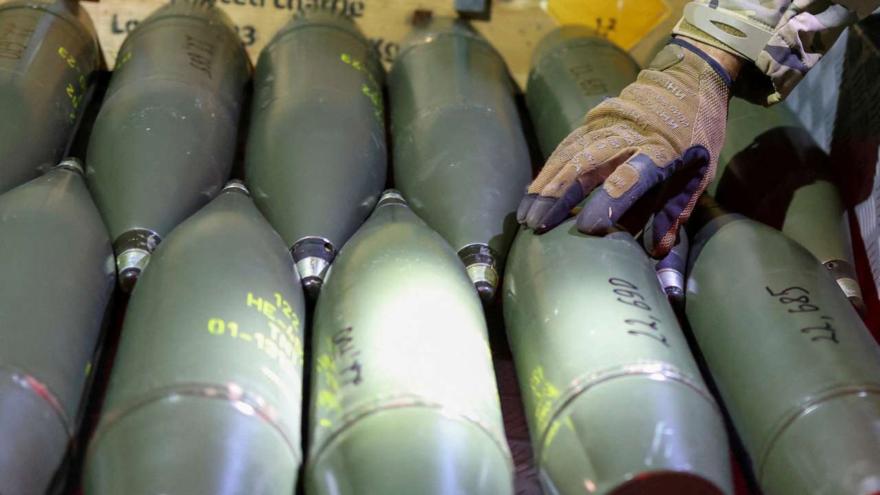 FILE PHOTO: Ukrainian serviceman checks artillery shells in southern Ukraine
