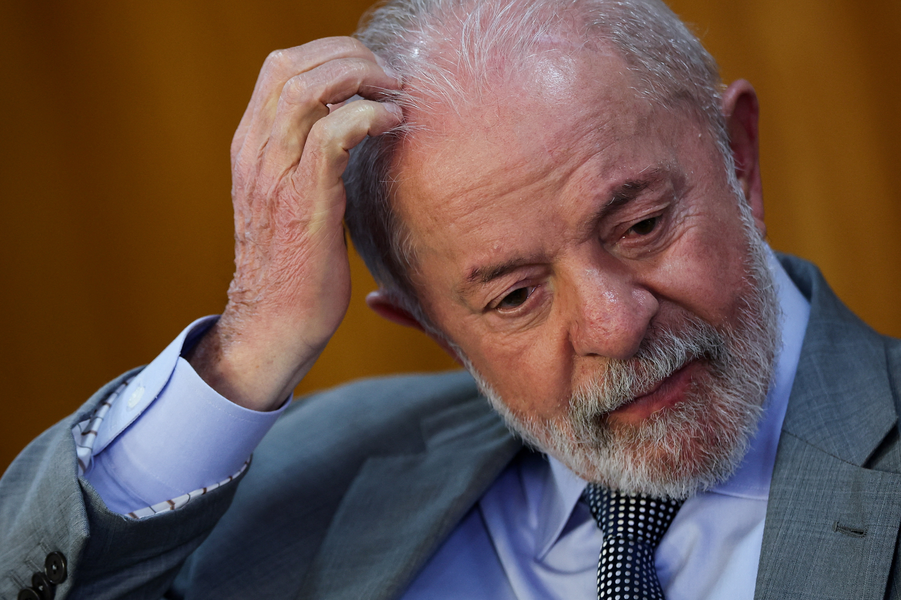 Brazil's President Luiz Inacio Lula da Silva reacts during a ceremony at the Planalto Palace in Brasilia
