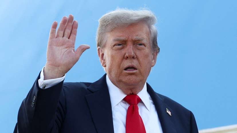 U.S. President Trump boards Air Force One as he departs for Alaska to meet with Russian President Putin