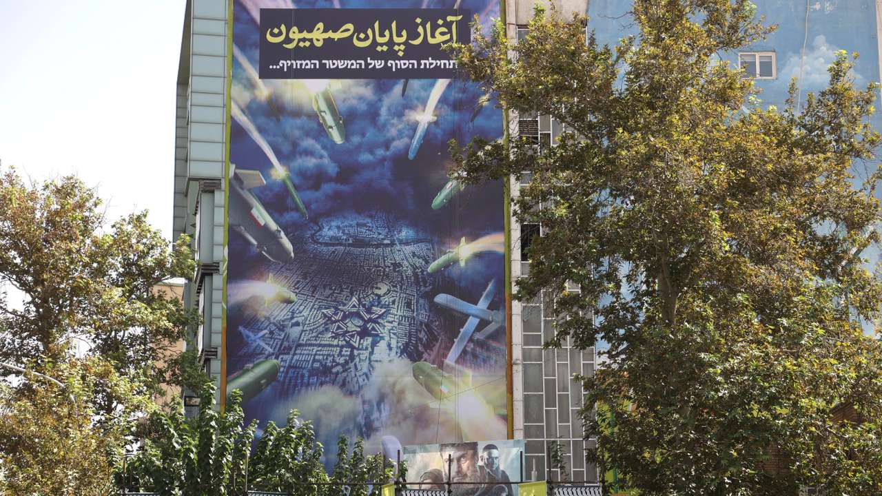 An anti-Israel billboard is displayed on a building in Tehran