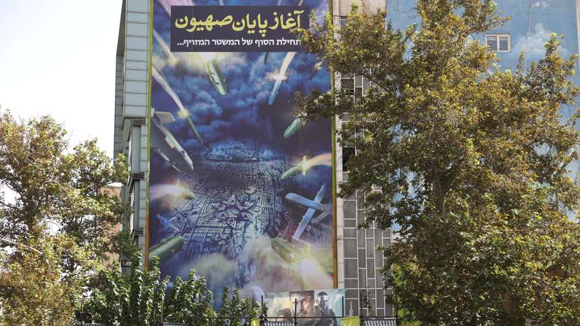 An anti-Israel billboard is displayed on a building in Tehran
