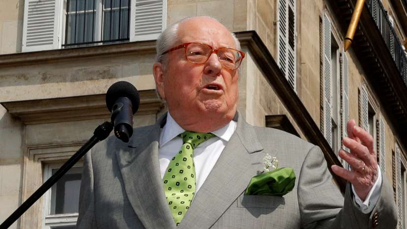French far-right National Front (FN) founder Jean-Marie Le Pen attends a May Day ceremony in front of the statue of Jeanne d'Arc (Joan of Arc) in Paris