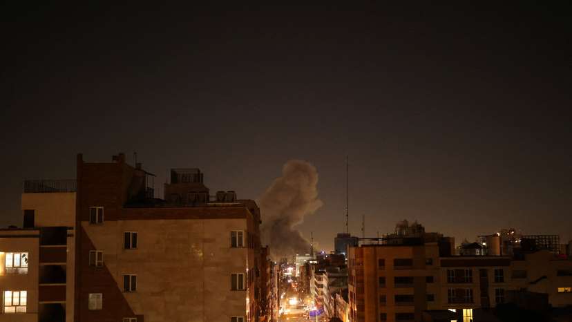 Smoke rises following an explosion, after Israel and the U.S. launched strikes on Iran, in Tehran