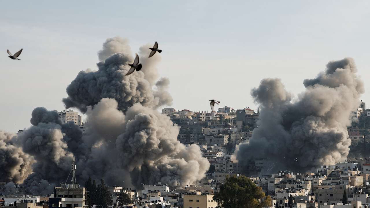 Smoke rises after an Israeli strike, in Jenin