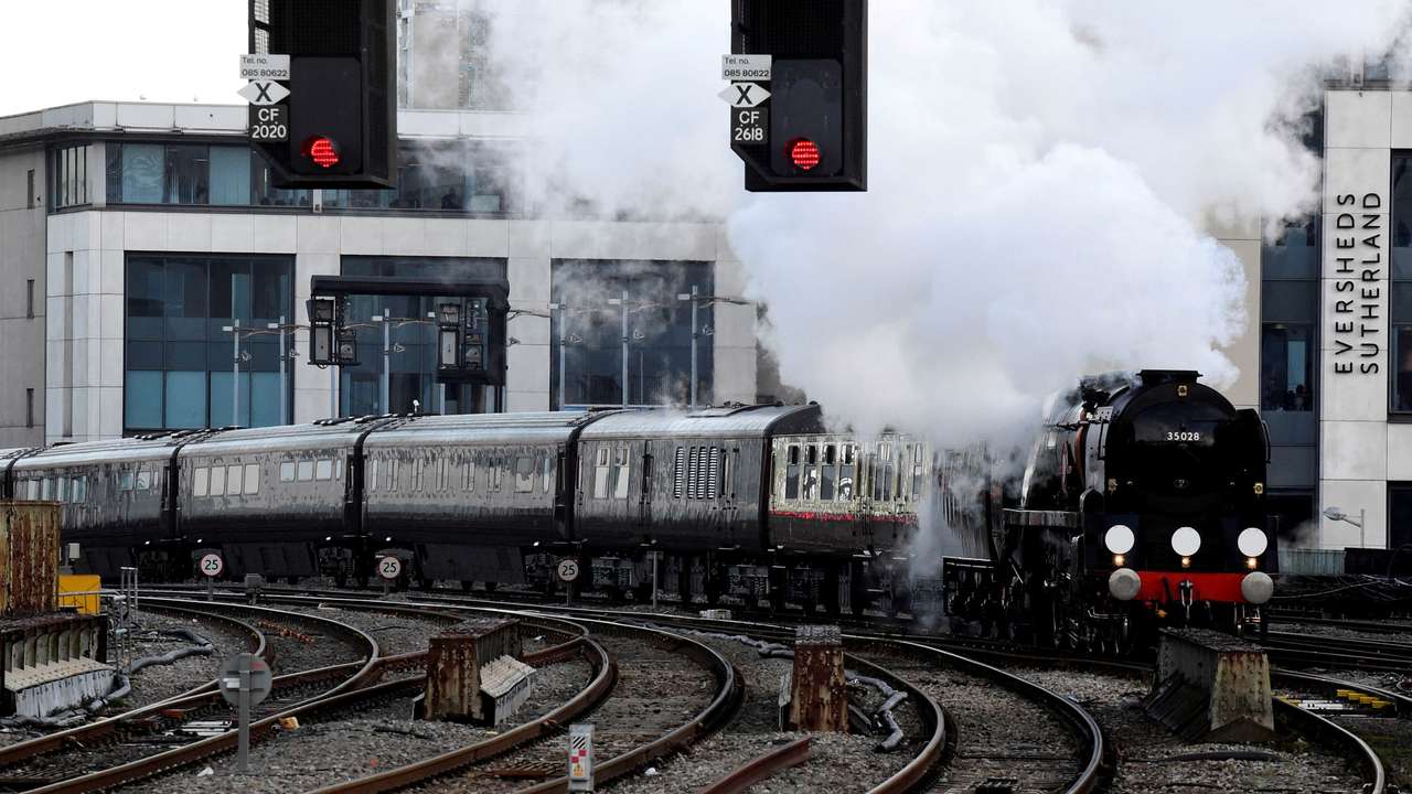FILE PHOTO: Britain's Prince Charles arrives on the Royal Train, pulled by a steam locomotive, at Cardiff Central Rail Station in Cardiff