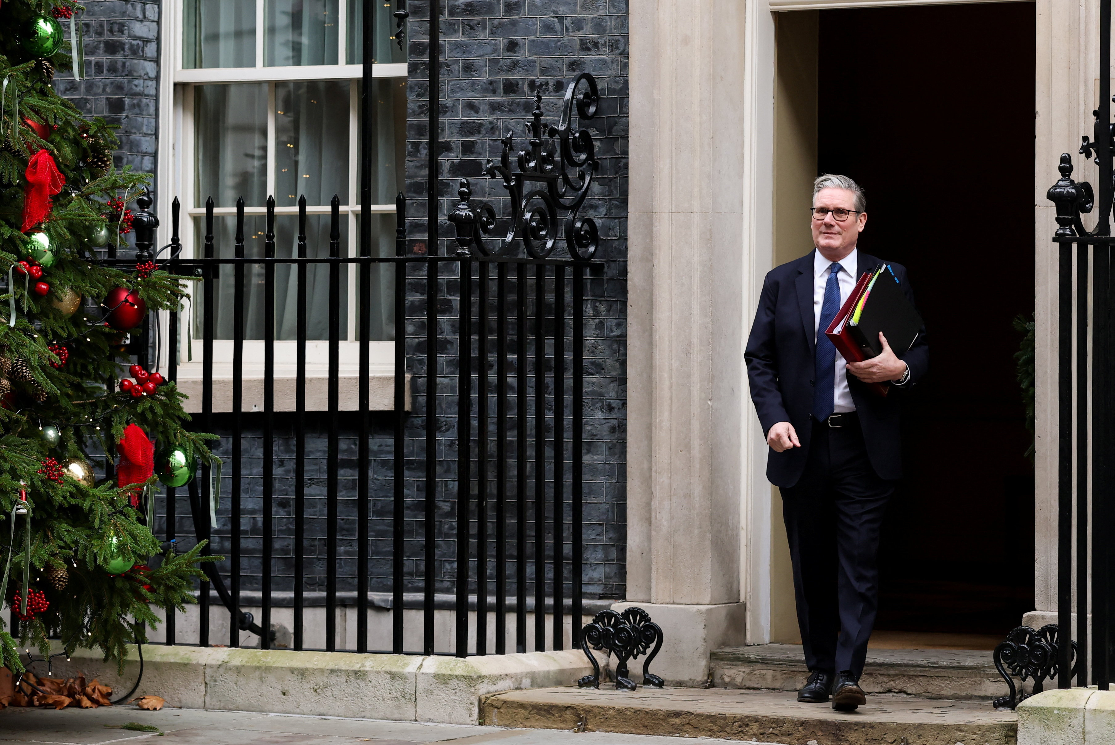 British PM Starmer leaves Downing Street for PMQs, in London