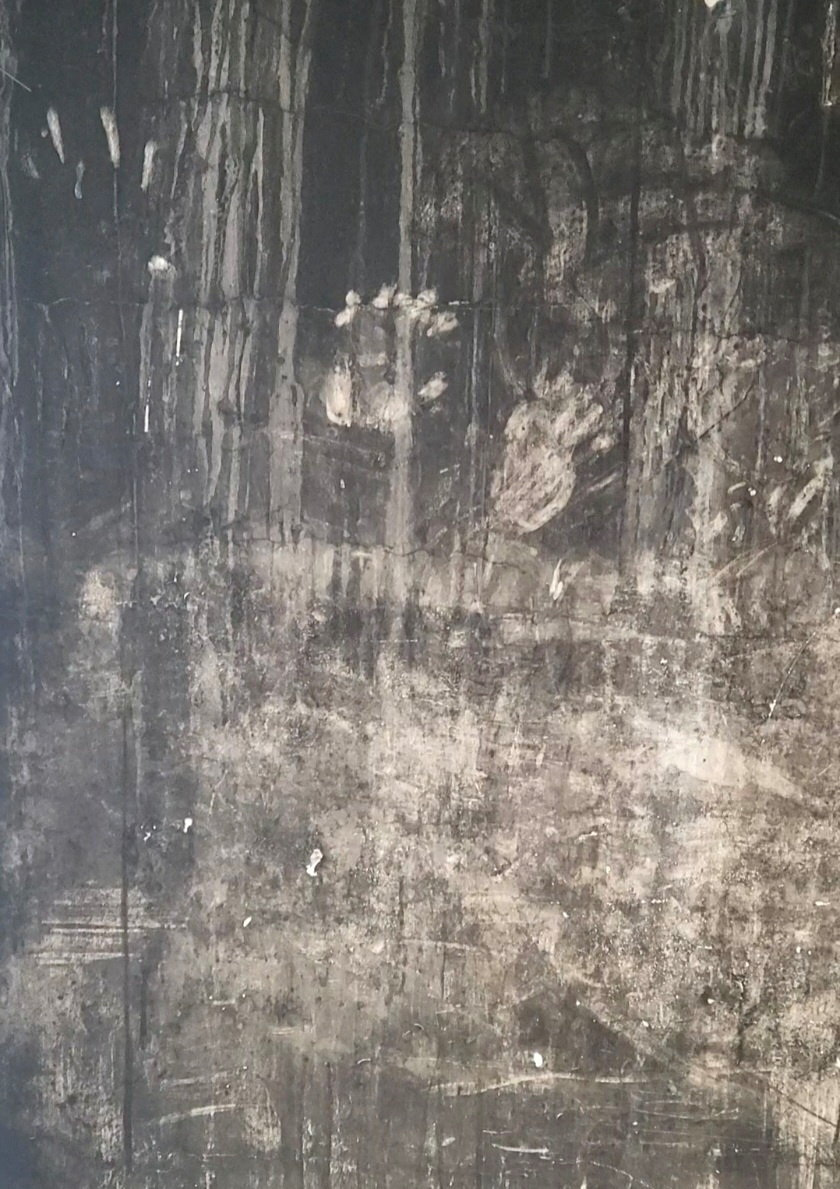 FILE PHOTO: Handprints on a blackened wall at Grenfell Tower, in London