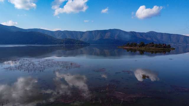 A drone view shows Aculeo lagoon following a pouring rain season, in Aculeo, Metropolitan region, Chile