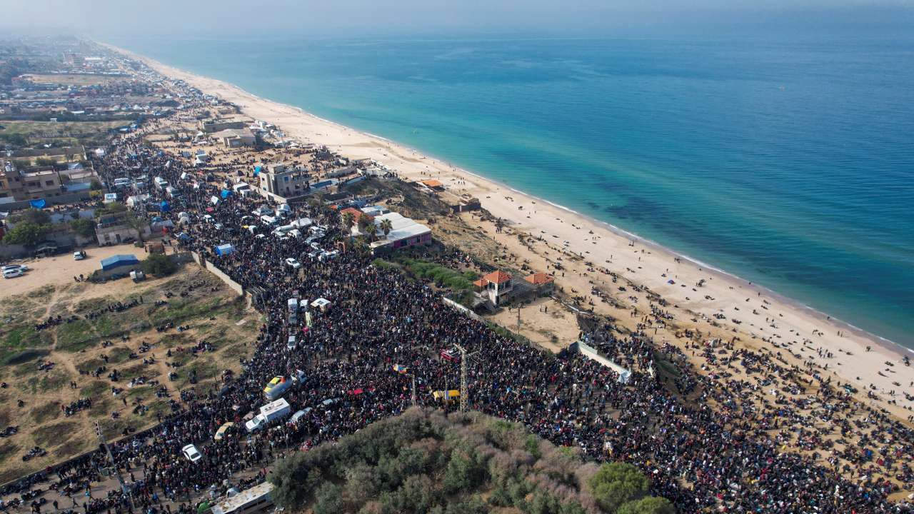 A drone view shows displaced Palestinians waiting to be allowed to return to their homes in northern Gaza, in the central Gaza Strip
