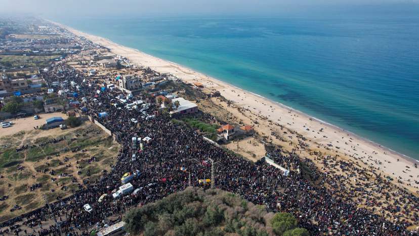 A drone view shows displaced Palestinians waiting to be allowed to return to their homes in northern Gaza, in the central Gaza Strip