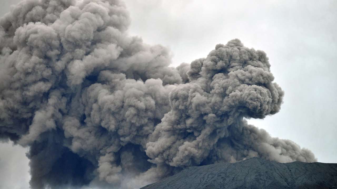 Mount Marapi volcano spews volcanic ash as seen from Nagari Batu Palano in Agam