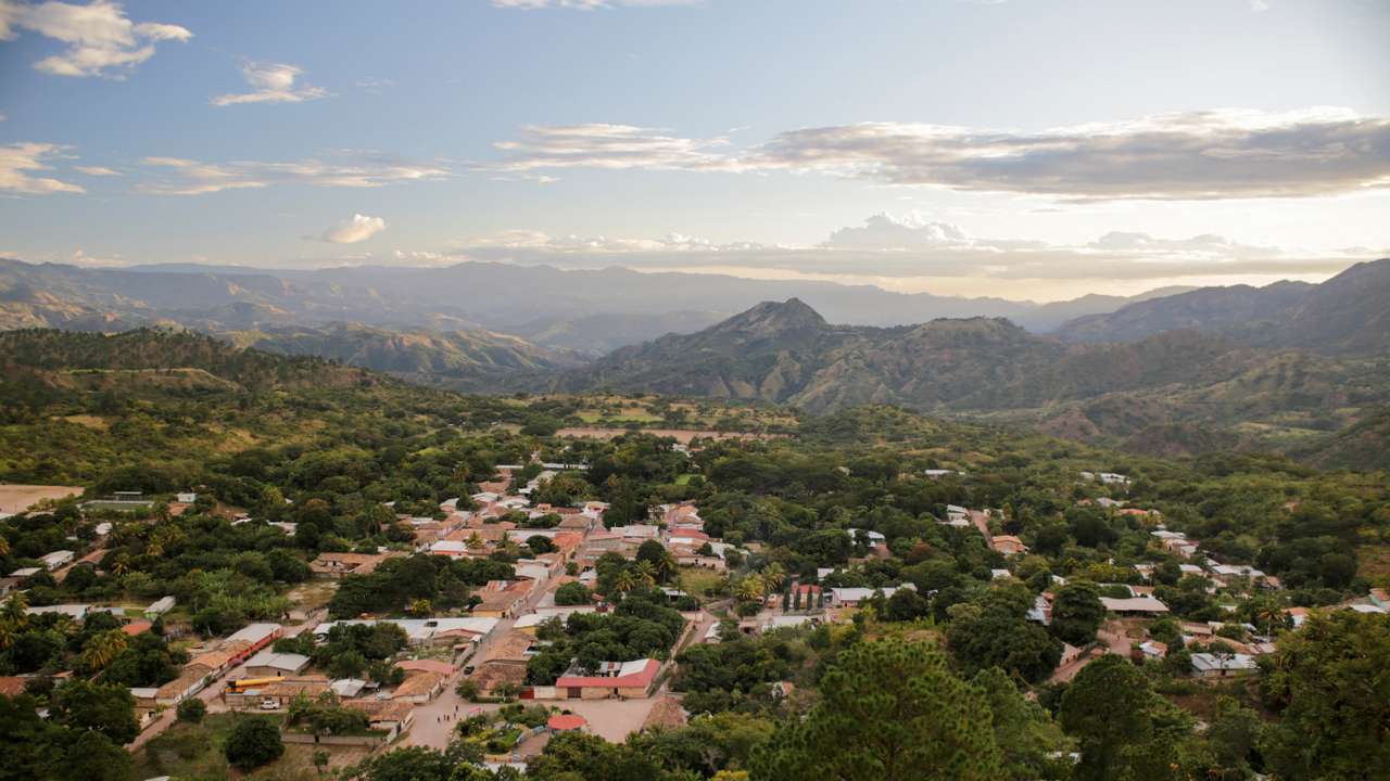 Residents head to vote in a rural town a week after election day, in San Antonio de Flores