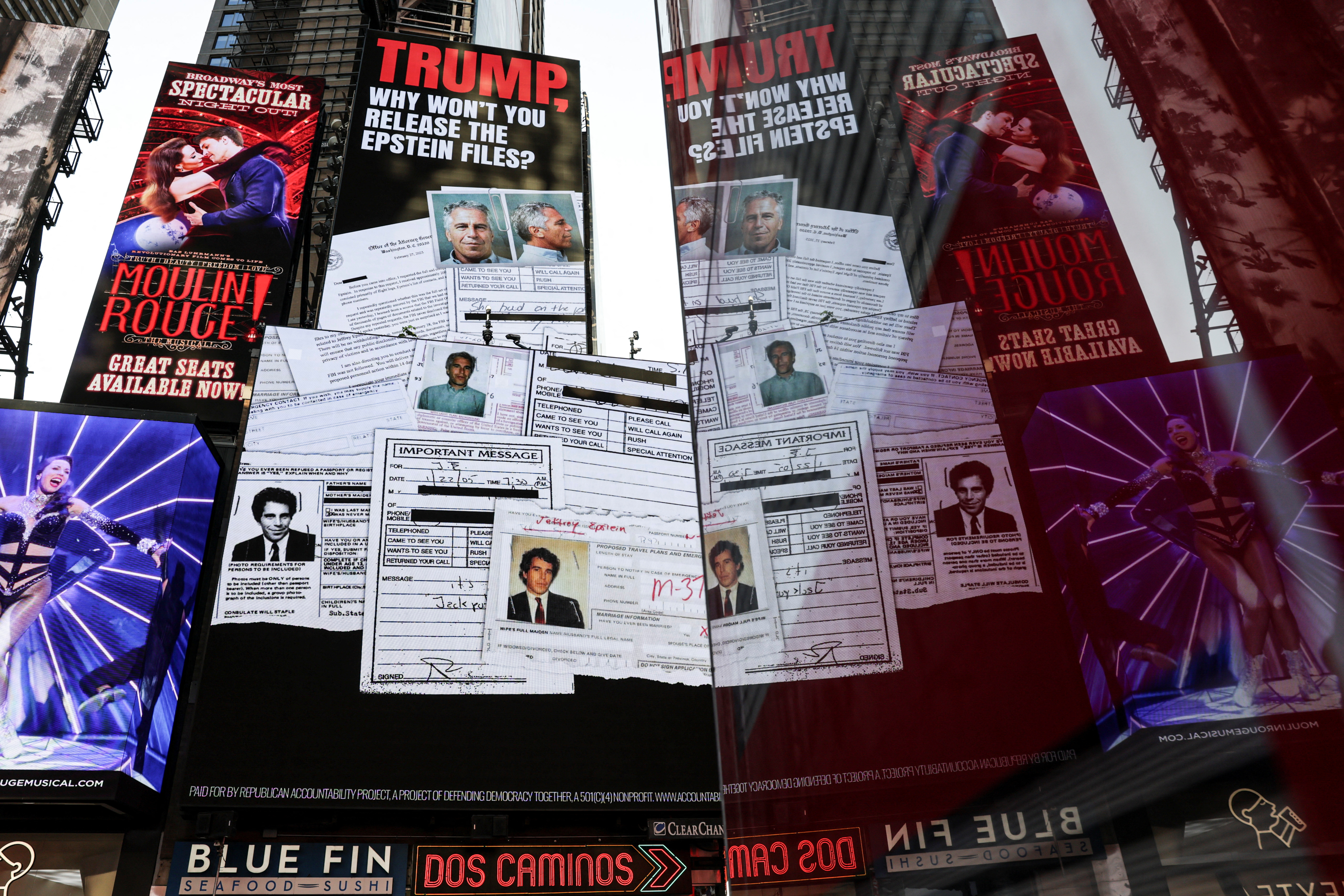 A screen about the Jeffrey Epstein files is displayed at Times Square in New York City