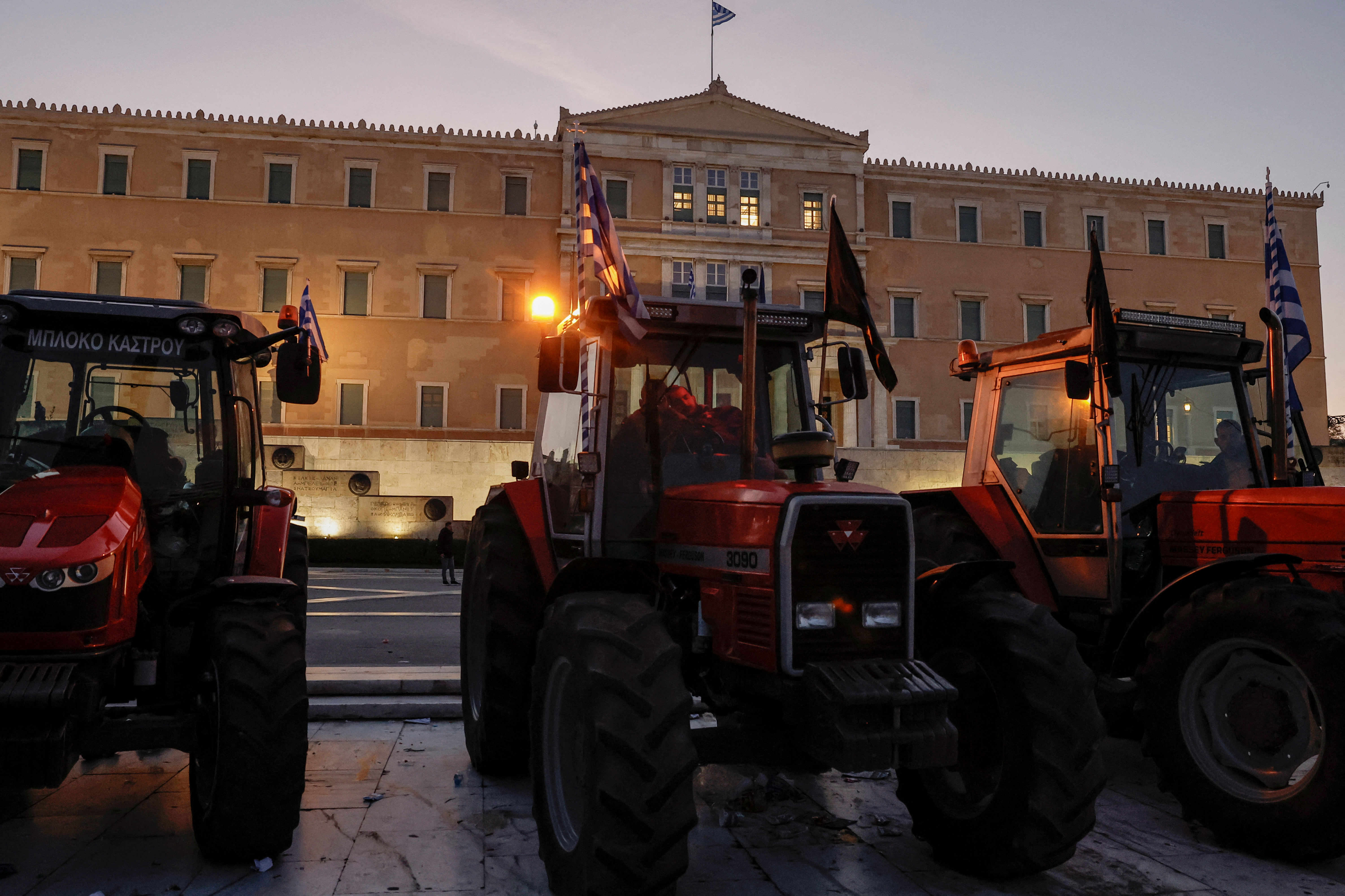 Farmers spend the night outside parliament in Athens