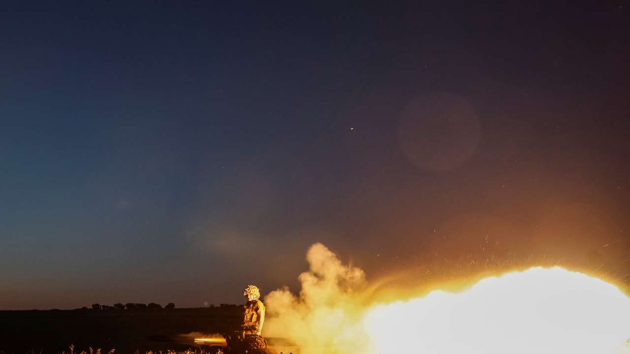 Ukrainian service members attend military drills near a frontline in Donetsk region